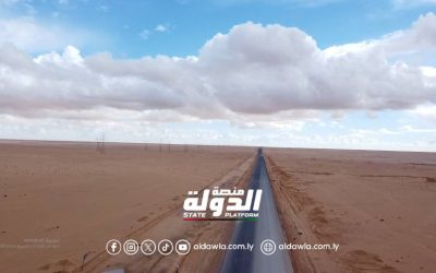 الجهاز الوطني للتنمية يواصل أعمال الرصف بطريق أجدابيا – جالو بوتيرة متسارعة